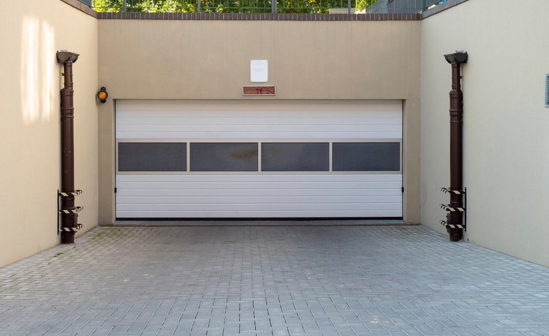 Fabrication et pose de porte de garage roulante près de Berck